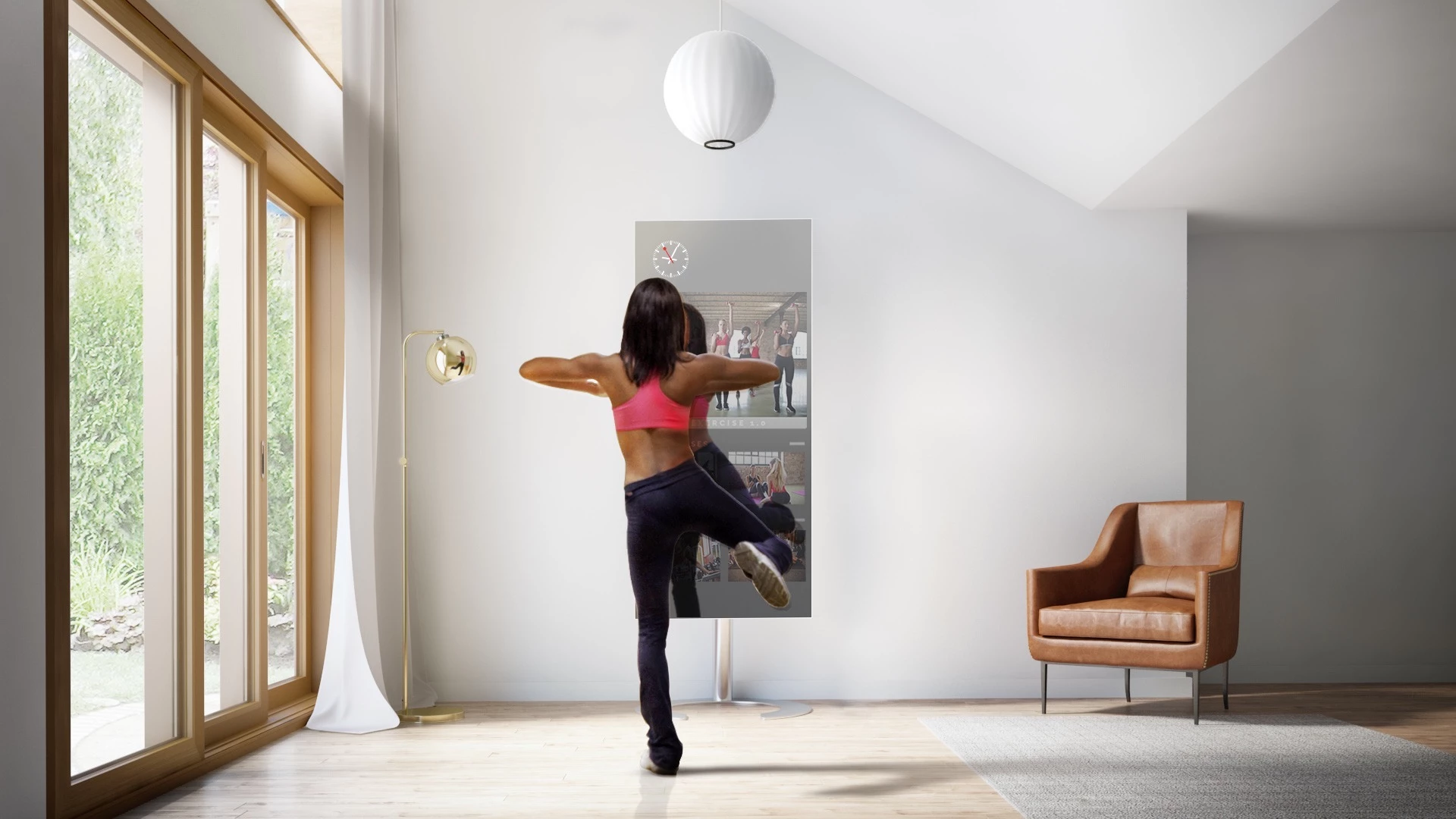 Woman using an interactive fitness mirror for dance practice in a bright room in Kuwait.